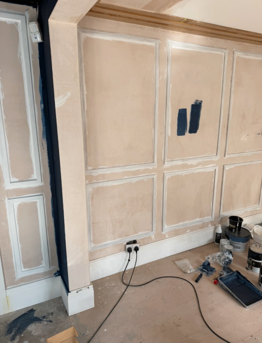 Panelling fitted, filled and sanded on the walls