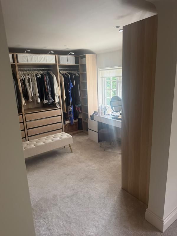 View through a doorway into the dressing room wardrobes