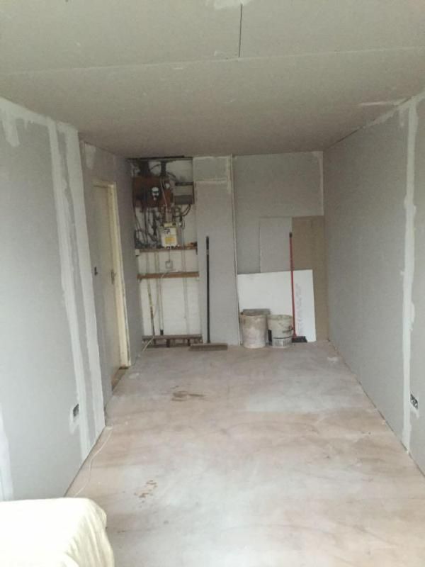 Garage interior stripped back during the conversion works