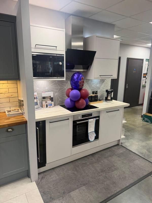 White and grey showroom display kitchen